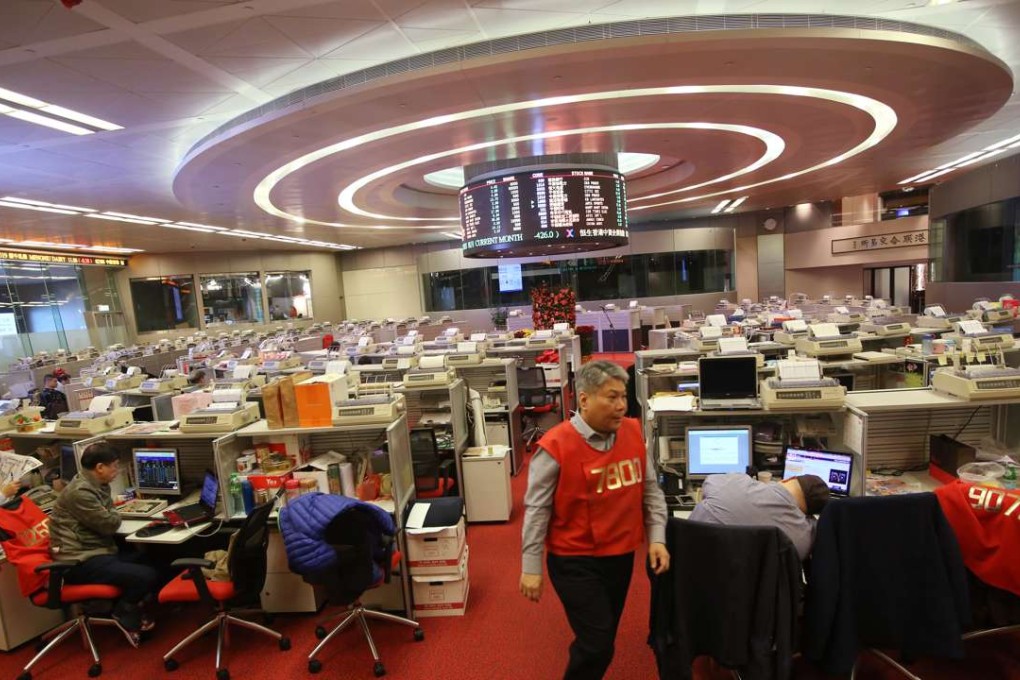 Traders on the trading floor at the Hong Kong Stock Exchange. Photo: Sam Tsang