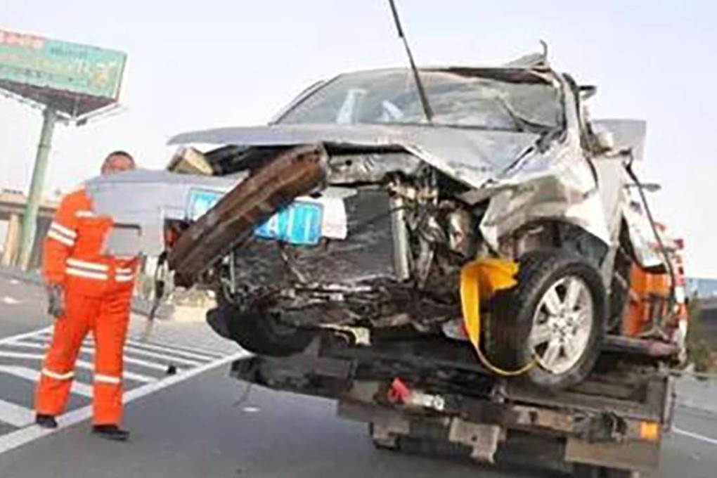 The wreckage of a car in which a Chinese man reportedly deliberately killed himself after a row with his girlfriend. Photo: SCMP Pictures
