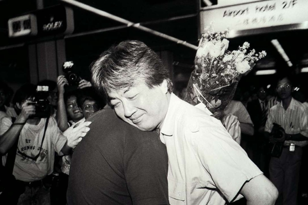 Chinese dissident author Liu Binyan (left) is greeted by novelist Chen Ying-chen at Kai Tak Airport in 1988. They were in the city for a three-day conference on Chen's literary achievements and cultural criticism. Photo: David Wong