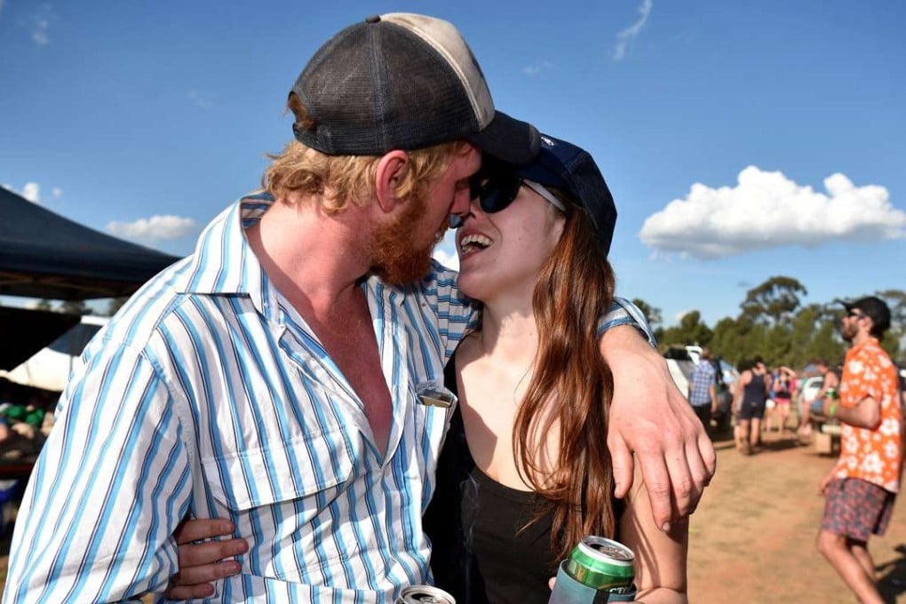 A couple before a Bachelor and Spinster ball in the town of Ariah Park in western New South Wales. Photo: AFP