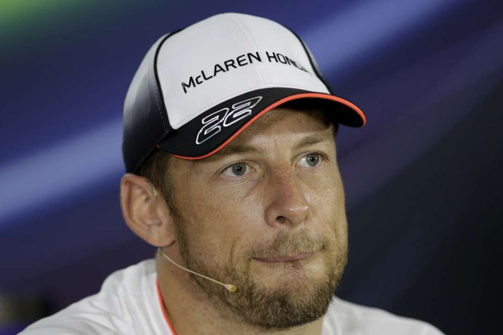 McLaren driver Jenson Button announces his retirement at a press conference in Abu Dhabi on Thursday. Photo: AP
