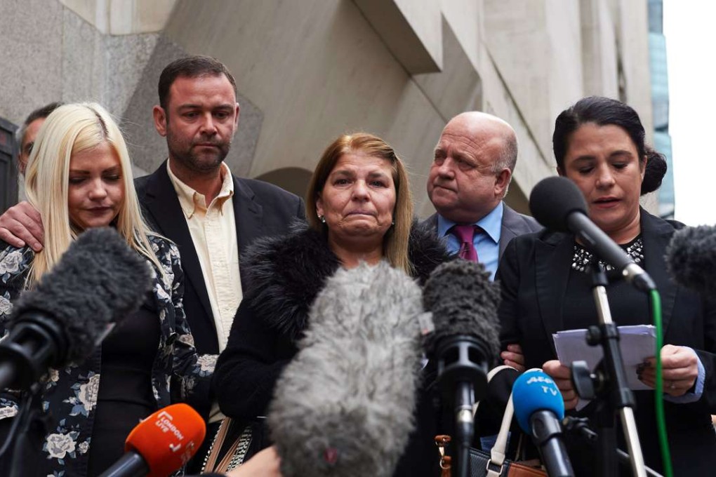 Jenny Taylor (left) and Donna Taylor (right) accompany their mother Jeanette Taylor, mother of slain Jack Taylor as they deliver a statement to the media outside the Central Criminal Court in London on Wednesday, where serial killer Stephen Port was found guilty on Wednesday. Photo: AFP