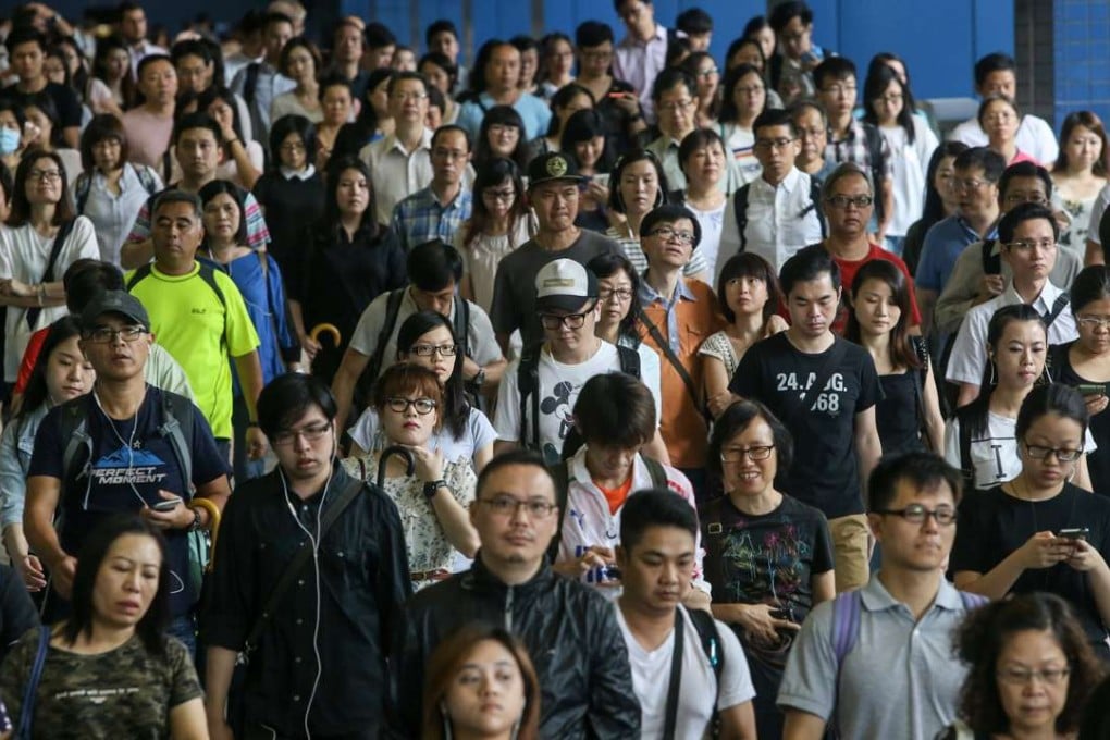 Commuters at Tai Wai MTR station on the East Rail line. Picture: SCMP