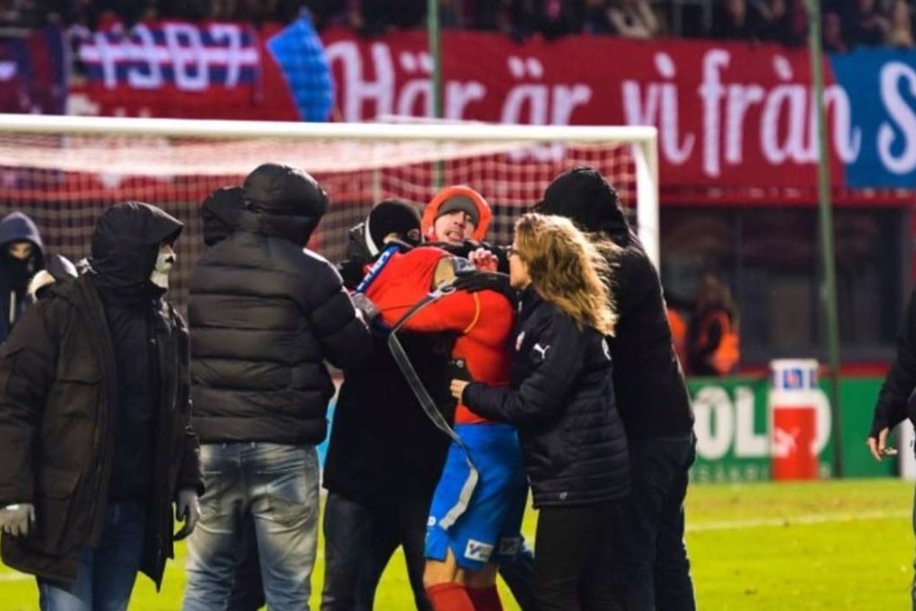 Henrik Larsson and his son Jordan were attacked by angry fans following Helsingborg’s relegation form the top division on Sunday.