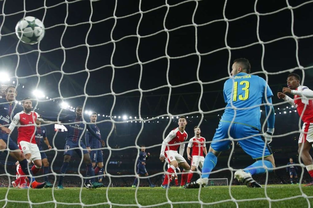 Arsenal’s Alex Iwobi nets an own goal during the 2-2 draw with French champions Paris Saint-Germain at the Emirates. Photo: Reuters