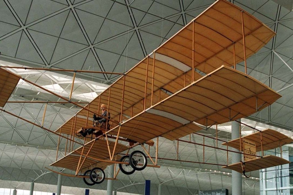 The full-scale replica of the Farman biplane hangs at Hong Kong Interntional Airport. Photo: SCMP Pictures