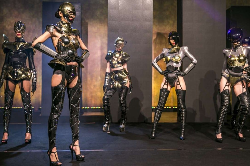 Fantasy leather outfits by Spanish designer Manuel Albarran featured at a Michelin gala dinner at Macau’s Studio City.