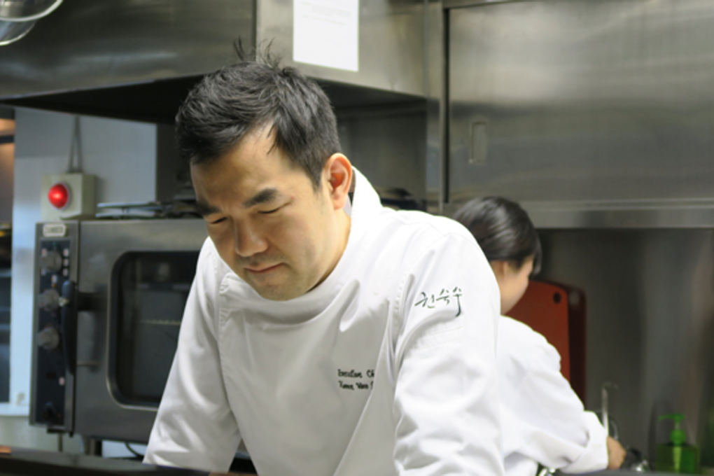 Chef Kwon Woo-joong is in deep thought in his restaurant kitchen before testing a new menu to be released for the winter season. Photo: Korea Times/Yun Suh-young