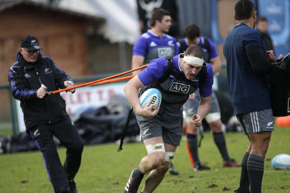 New Zealand’s Brodie Retallick stretches during a training session in Suresnes, outside Paris, ahead of their clash with France on Saturday. Photo: AP