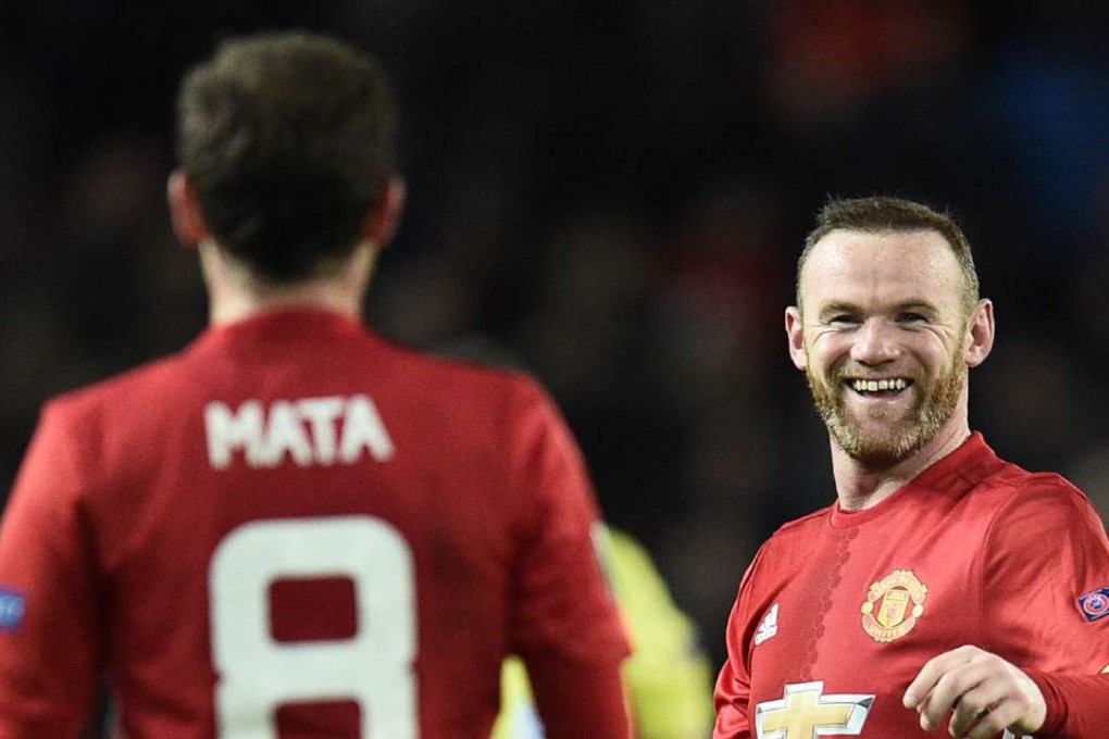 Manchester United captain Wayne Rooney celebrates after Juan Mata’s goal in the 4-0 Uefa Europa League win over Feyenoord. Photo: AFP