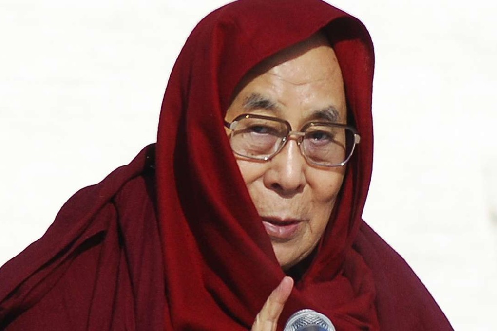 The Dalai Lama speaks at the Janraiseg temple of Gandantegchinlen monastery in Ulaanbaatar, Mongolia. Photo: AP
