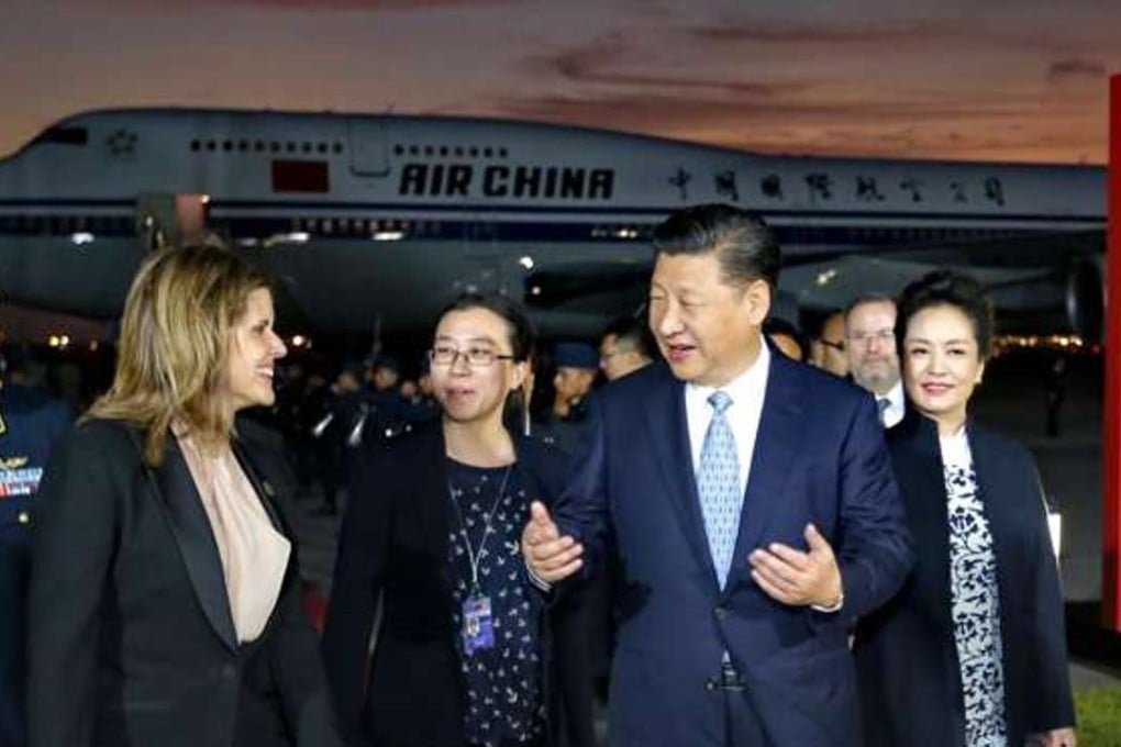 President Xi Jinping and his wife, Peng Liyuan, far right, are welcomed to Peru by Second Vice-President Mercedes Araoz. Photo: Xinhua