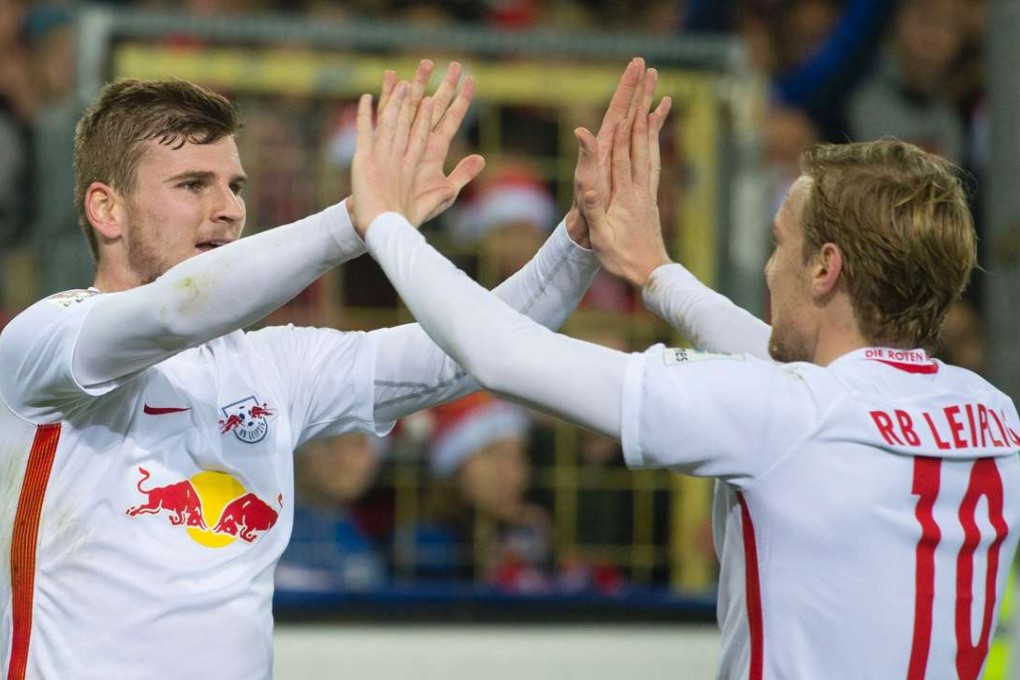 Leipzig forwards Timo Werner and Emil Forsberg celebrate another goal as they thrashed Freiburg to go well clear at the top of the German Bundesliga. Photo: AFP