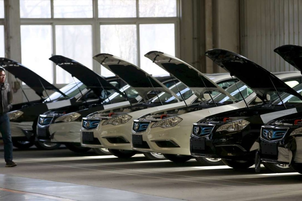 A row of electric cars at a factory operated by Beijing Electric Vehicle, funded by BAIC Group. Japan’s GLM is targeting Chinese carmakers with its EV technology. Photo: Reuters
