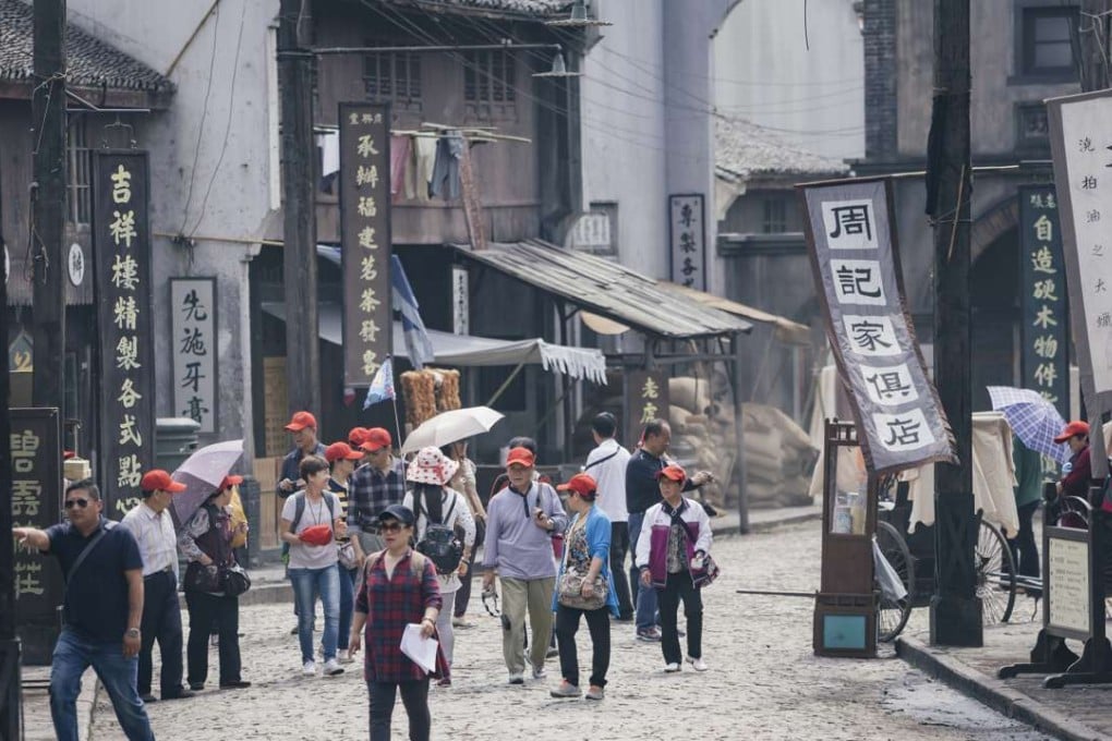 Tourists pictured visiting the Shanghai Film Park’s recreation of the city’s old streets. Photo: SCMP Pictures