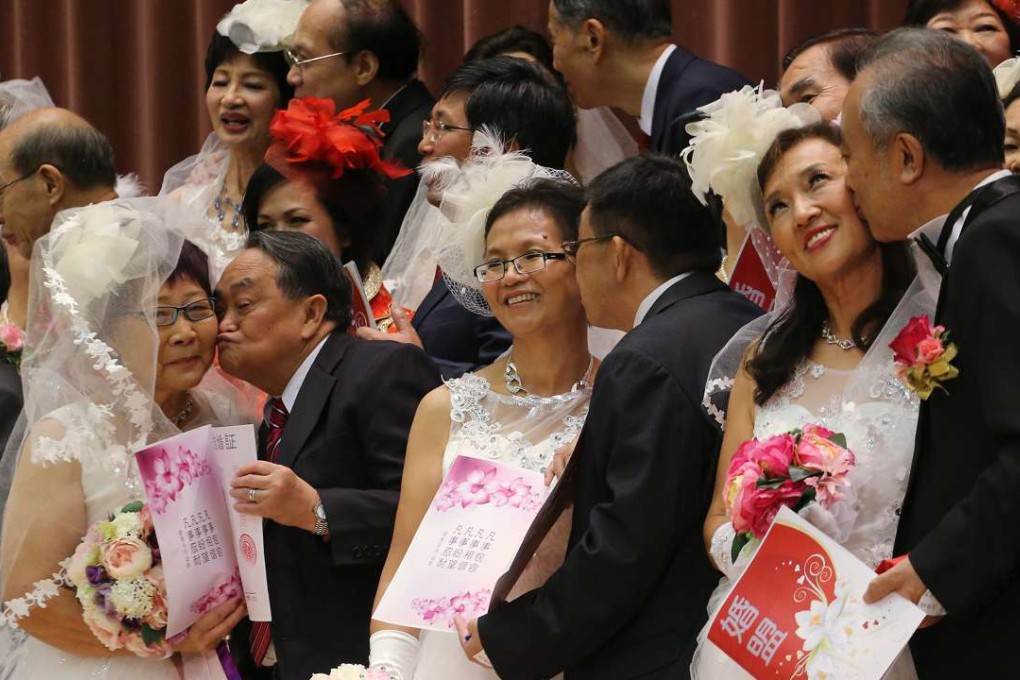 Elderly couples renew their wedding vows at the Leighton Hill Community Hall in Happy Valley on September 20 last year. Photo: Felix Wong