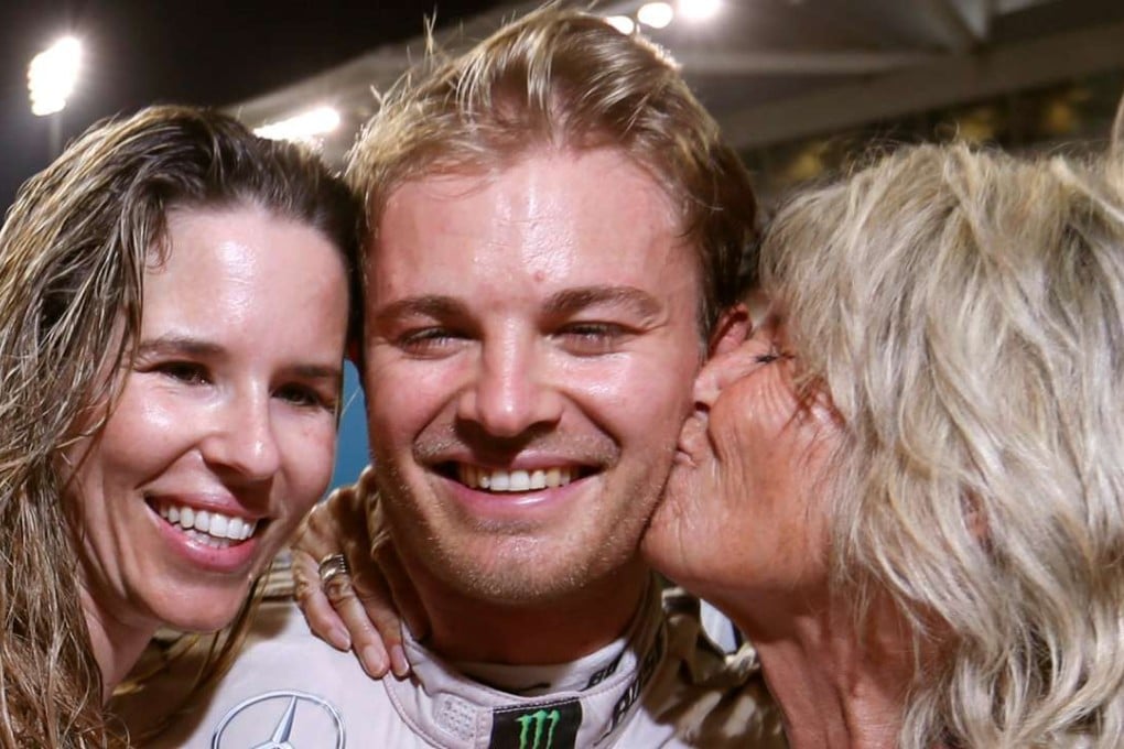 Nico Rosberg celebrates with his mother (right) and wife. Photo: Reuters
