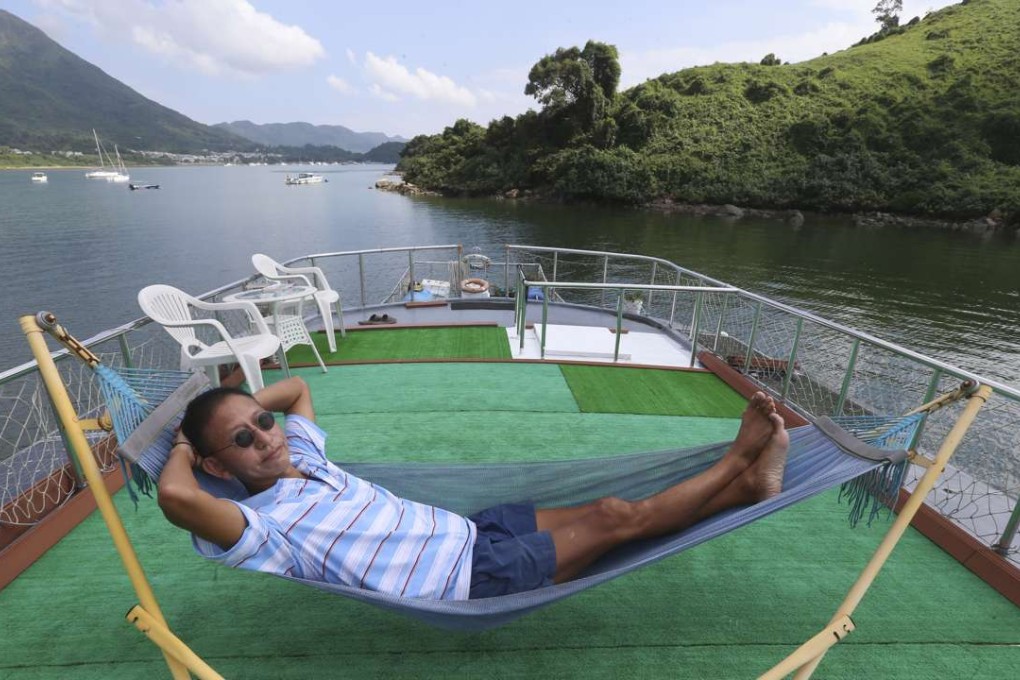Jacky Leung prefers to live on his boat rather than in his small Tai Po flat. He believes young Hongkongers frustrated with lack of private space should consider life on water, too. Photo: K.Y. Cheng