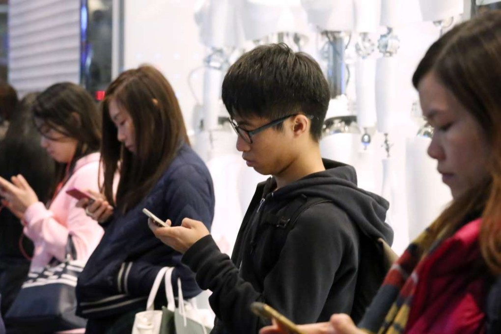 Consumers are charged very low prices for mobile services in Hong Kong but its spectral prices are among the highest in the world. Photo: Nora Tam