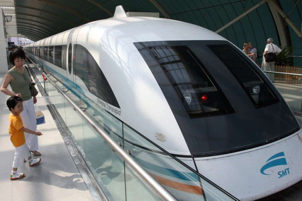 Passengers wait to board Shanghai's maglev train to Pudong airport. China Railway Rolling Stock has announced it plans to build its own high-speed maglev train. Photo: AFP