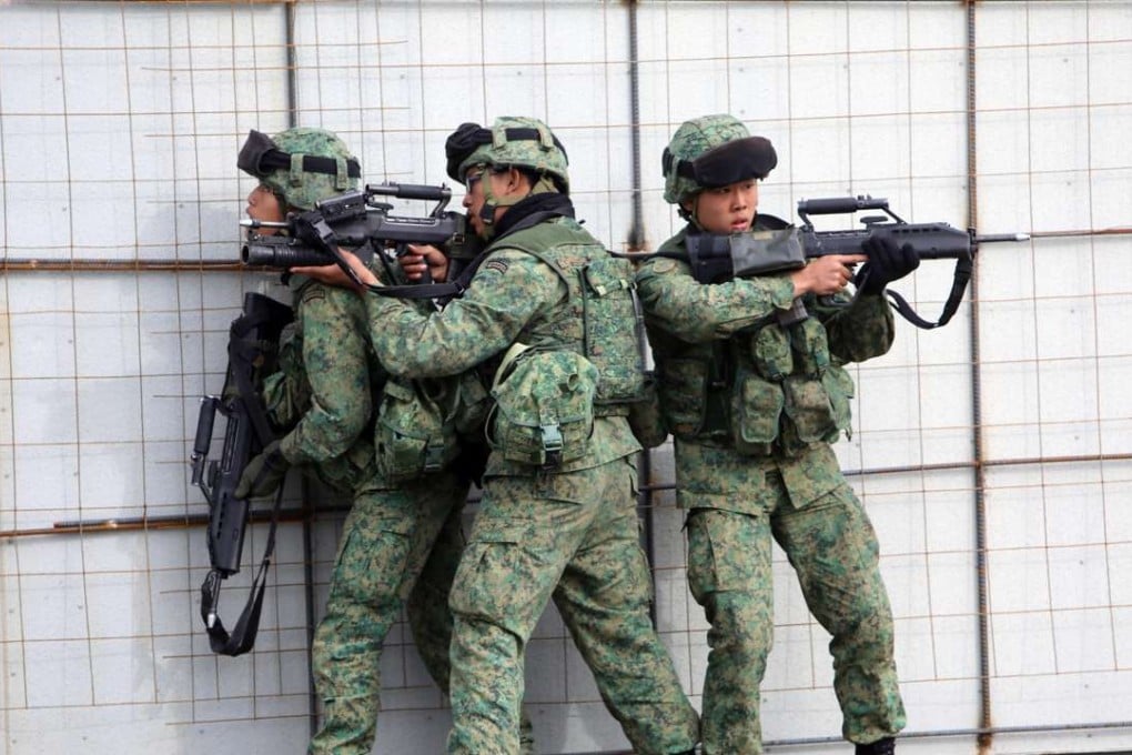 Soldiers with the 7th Singaporean Infantry Brigade take part in a joint training mission with US Marines in 2014 at Camp Pendleton, California. Beijing has expressed displeasure over Singapore holding training in Taiwan. Photo: Alamy