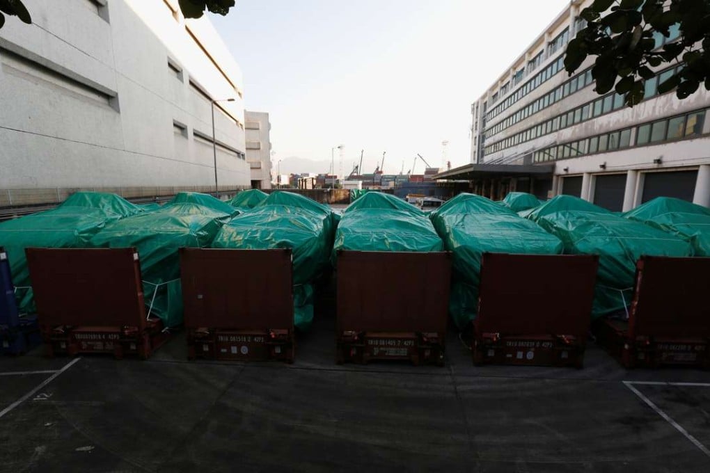 Armoured troop carriers, belonging to Singapore, are detained at a cargo terminal in Hong Kong. Photo: Reuters