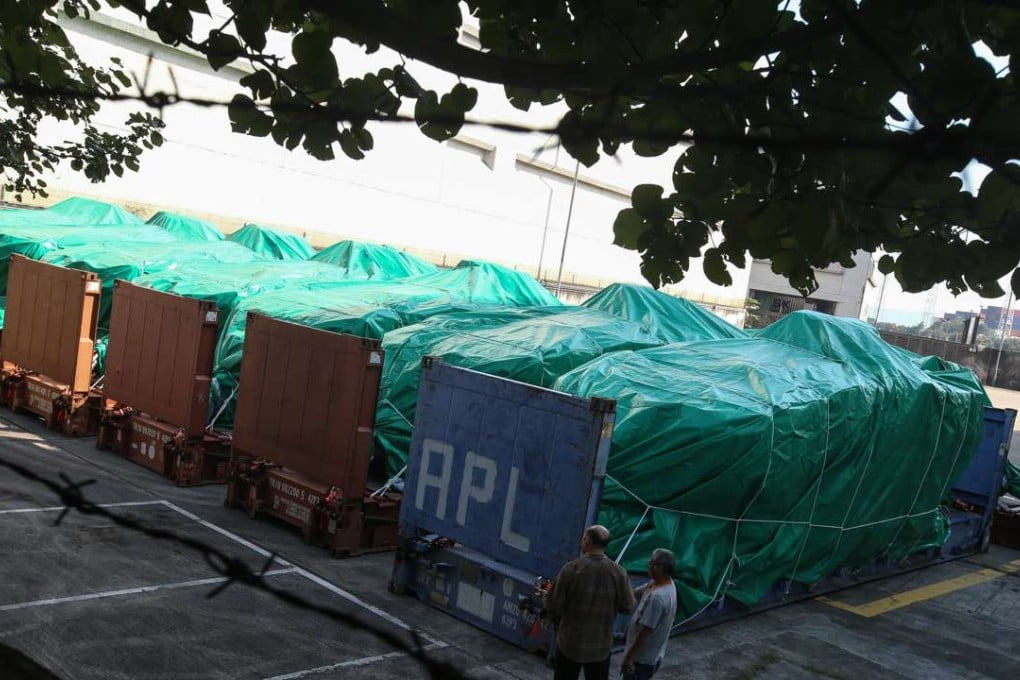 The seizure of the military vehicles on a Singapore-bound cargo ship from Taiwan at the Kwai Chung container terminal. 28NOV16 SCMP/David Wong