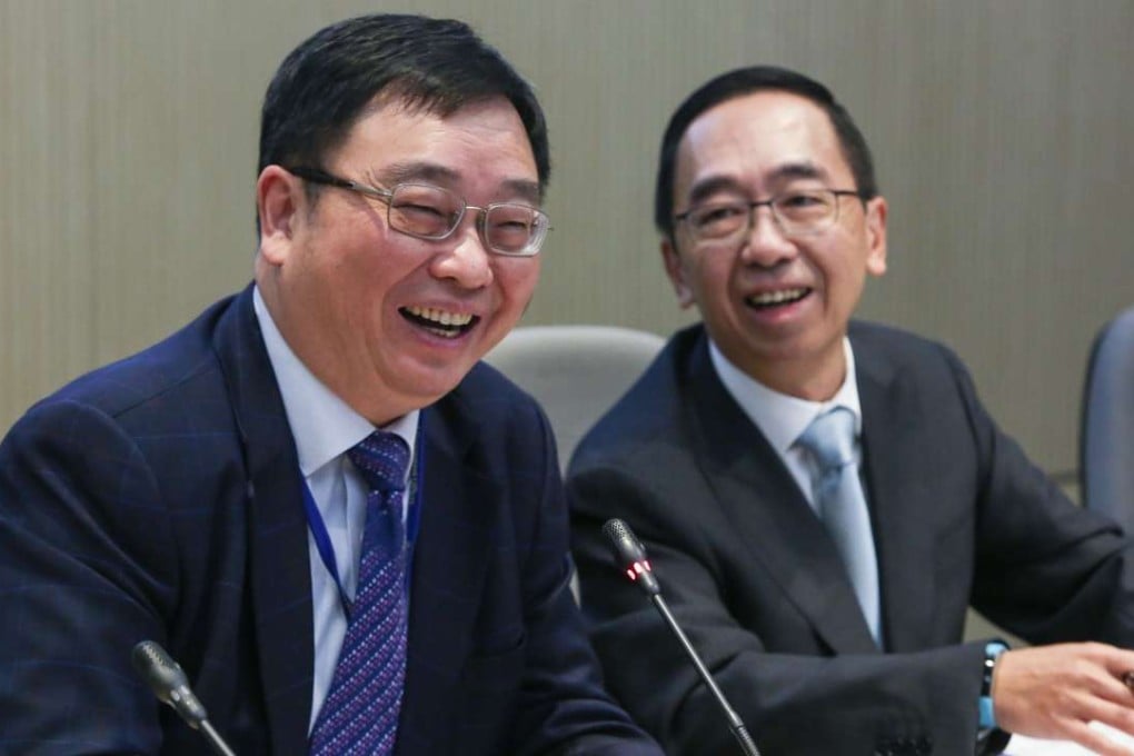 Senior advisor of the The Financial Services Development Council Esmond Lee (left) and member of the Mainland Opportunities Committee George Leung at the launch of the FSDC report on a mainland-Hong Kong bond connect scheme on Tuesday. Photo: Edmond So