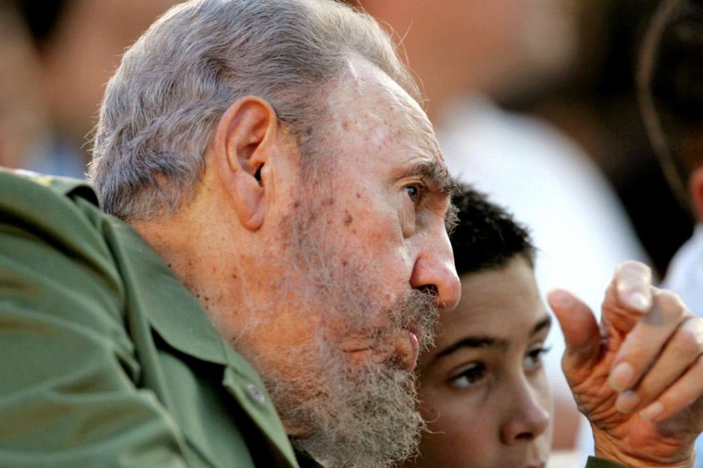 Cuba's President Fidel Castro (left) talks to Elian Gonzalez during a political rally in 2005. Photo: Reuters