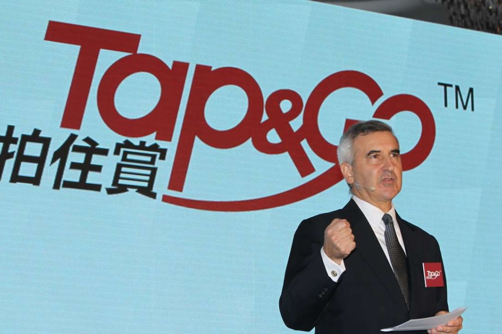 Alex Arena, managing director of HKT Group, helped lead the push to de-monopolise Hong Kong’s communications networks in his former role as head of the local communications regulator in the 1990s. This image shows Arena attending a press event as a director of HKT on July 27, 2015. Photo: Franke Tsang