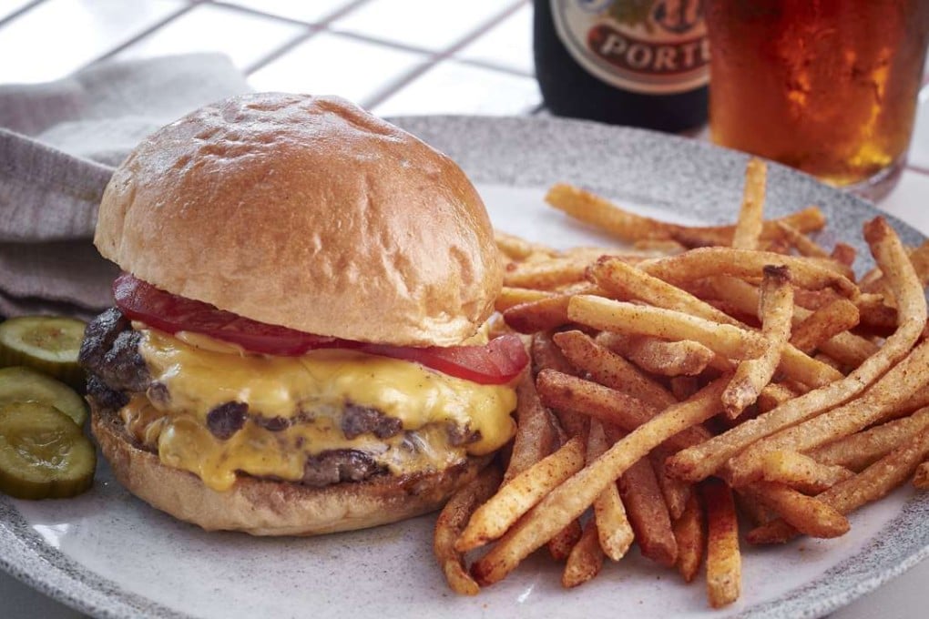 Cheeseburger and seasoned fries by Commissary in Admiralty.