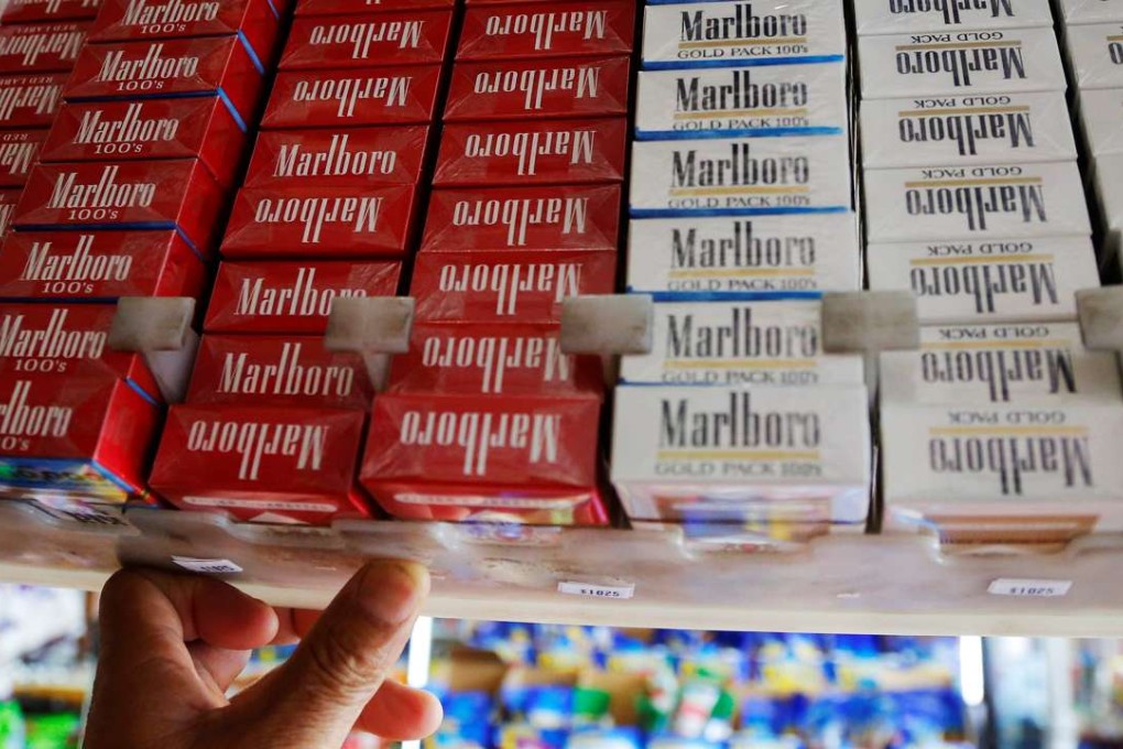 Packs of Marlboro cigarettes are displayed for sale at a convenience store. Photo: Reuters