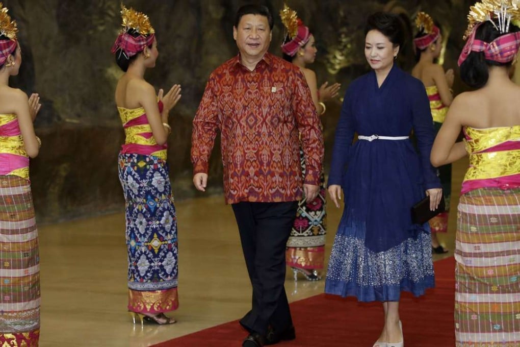 President Xi Jinping and his wife Peng Liyuan at the Asia-Pacific Economic Cooperation Summit in Nusa Dua, Bali, in October 2013. Photo: AFP