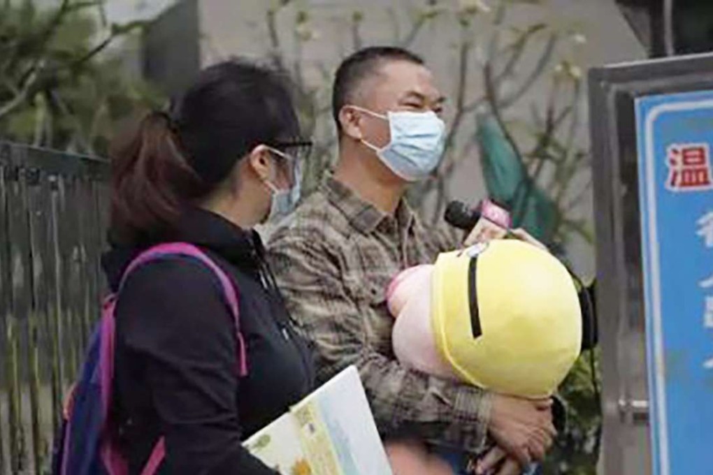 The child’s father Luo Er interviewed by the media. Photo: SCMP Pictures