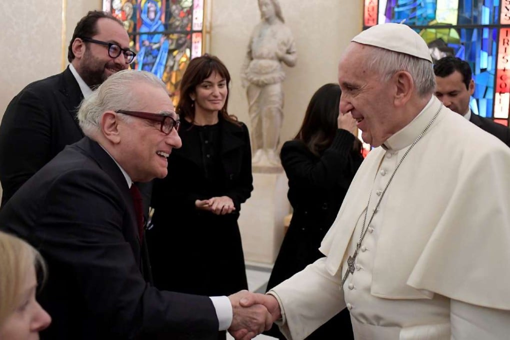 Pope Francis meets film director Martin Scorsese during a private audience at the Vatican.