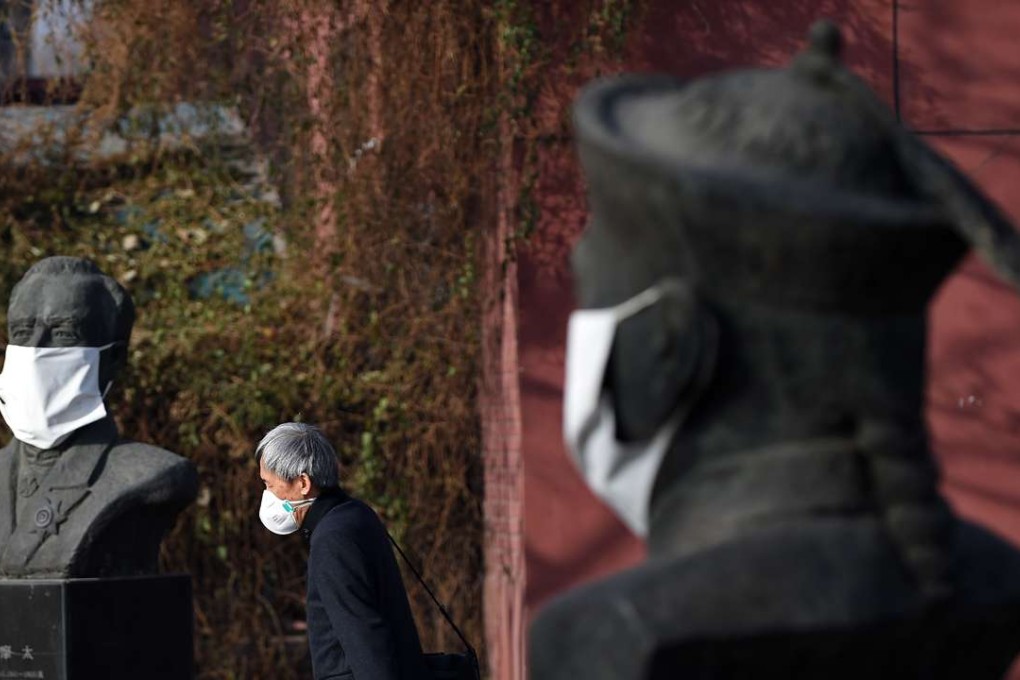 Masks protecting against pollution are a common sight in China, the world’s largest carbon emitter. Photo: China News Service