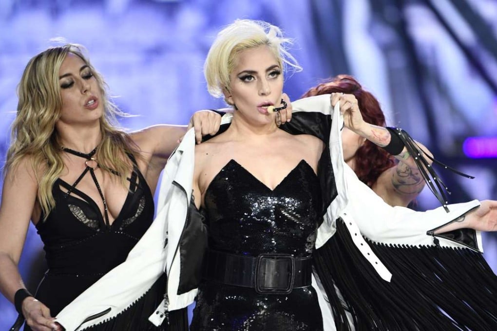 Lady Gaga (centre) performs during the 2016 Victoria's Secret Fashion Show at the Grand Palais in Paris. Photos: AFP