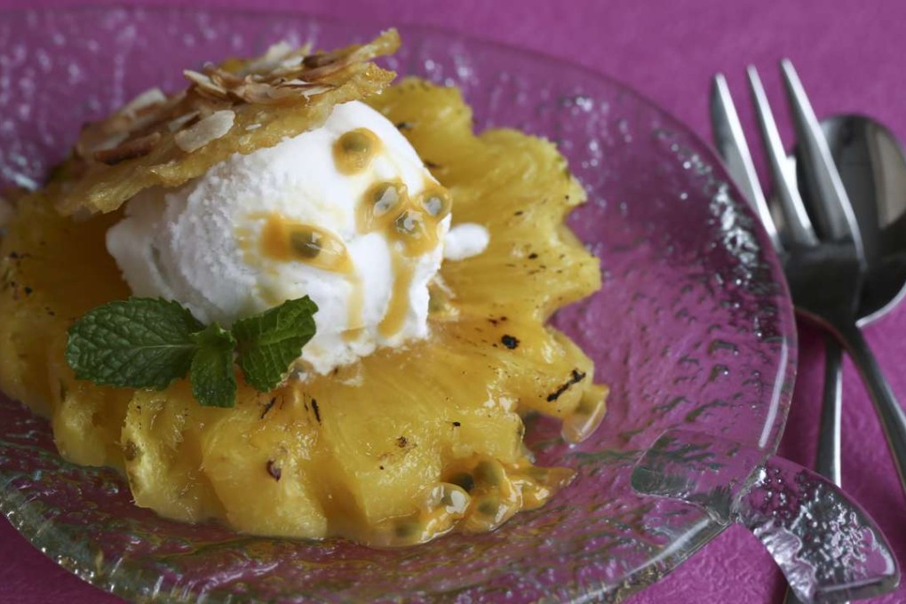 Roasted pineapple with pina colada sorbet. Picture: Jonathan Wong. Styling: Nellie Ming Lee
