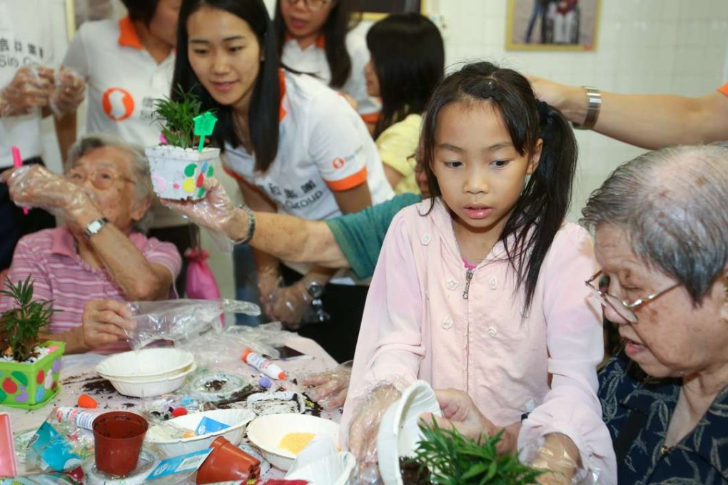 Eight-year-old Polly Lau and Wong Kwei-chang at the workshop. Photo: Xiaomei Chen