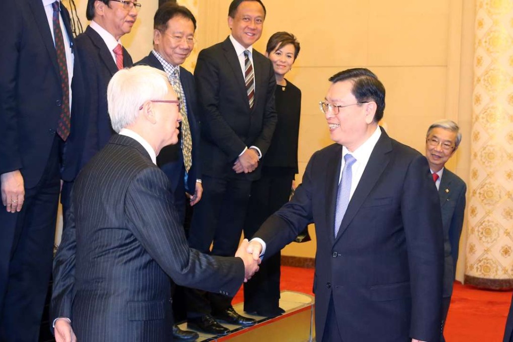 Robert Chow Yung led his delegation, Silent Majority for Hong Kong, to Beijing, meeting with Zhang Dejiang and other Chinese top officials. Photo: Xinhua