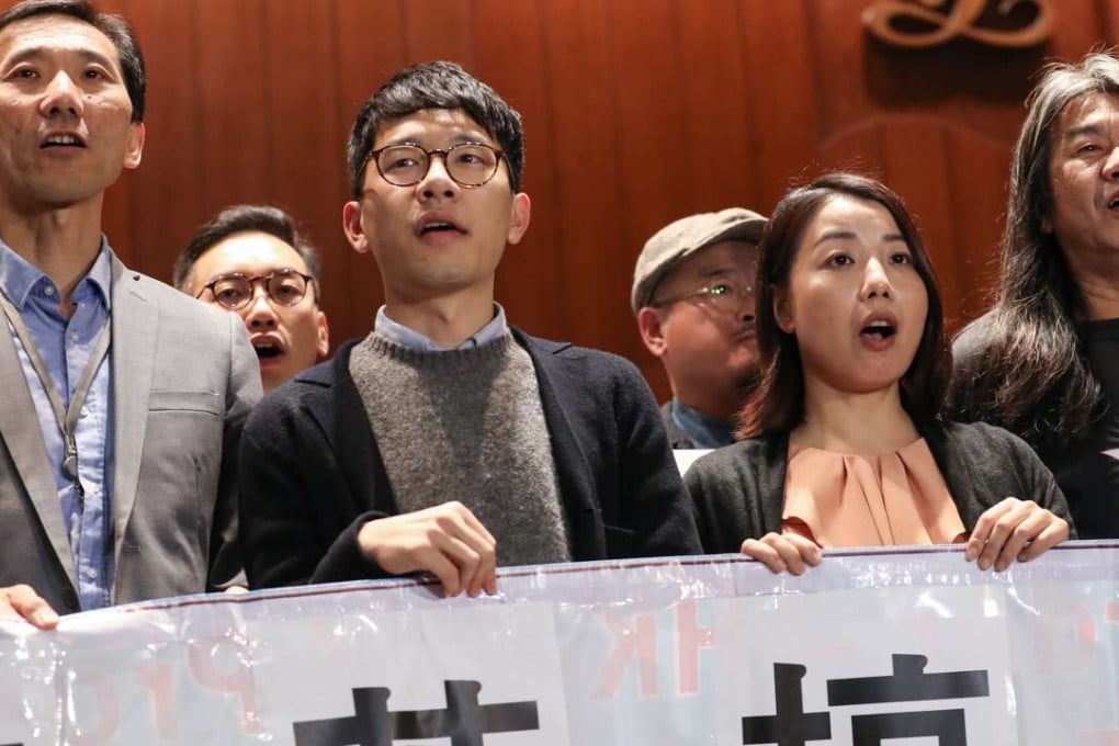 Edward Yiu (left), Nathan Law, Lau Siu-lai and ‘Long Hair’ Leung Kwok-hung protest against the government action. Photo: Nora Tam