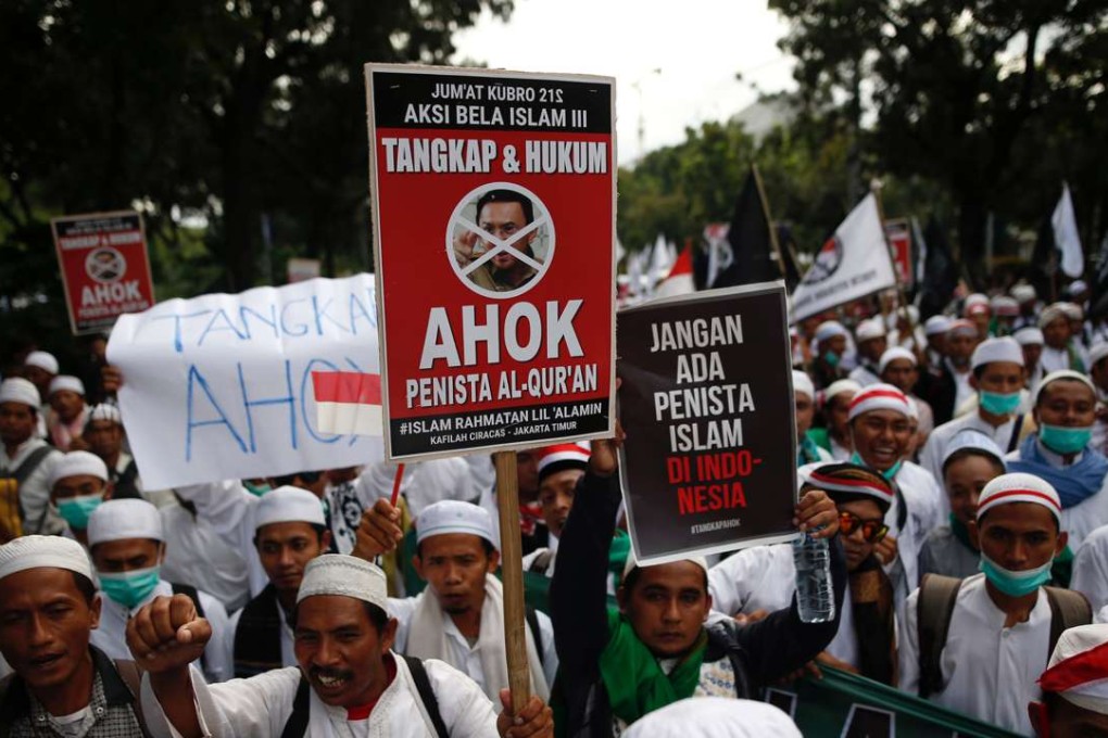 Indonesian Muslims attend a rally calling for the arrest of Jakarta’s Governor Basuki Tjahaja Purnama. Photo: Reuters