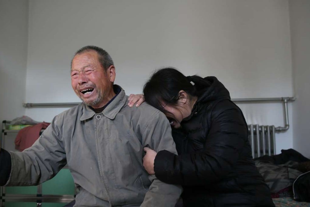 The father and sister of Nie Shubin, who was executed in 1995 for rape and murder, react in Shijiazhuang, Hebei province, after the Supreme People’s Court overturned Nie’s conviction. Photo: ChinaFotoPress