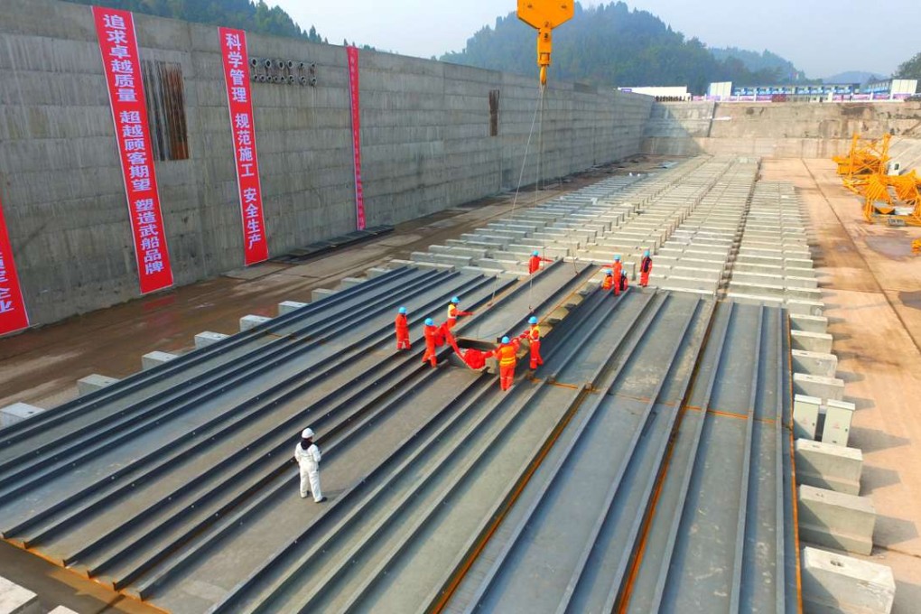 Labourers work at the construction site of the replica of the Titanic at a theme park in Daying county, Sichuan province. Photo: Reuters