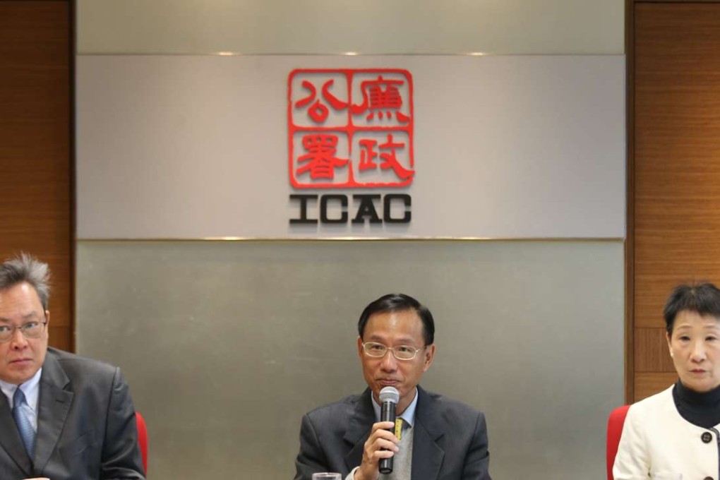 Siu Kin Foon (centre), principal corruption prevention officer at the Independent Commission Against Corruption, addresses a press conference on health care services at the ICAC headquarters in North Point on November 25. Photo: David Wong
