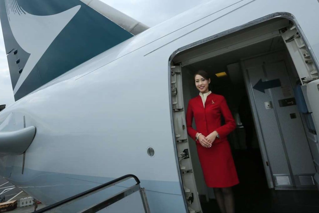This Cathay Pacific flight attendant will receive a 2 per cent pay rise. Photo: Jonathan Wong
