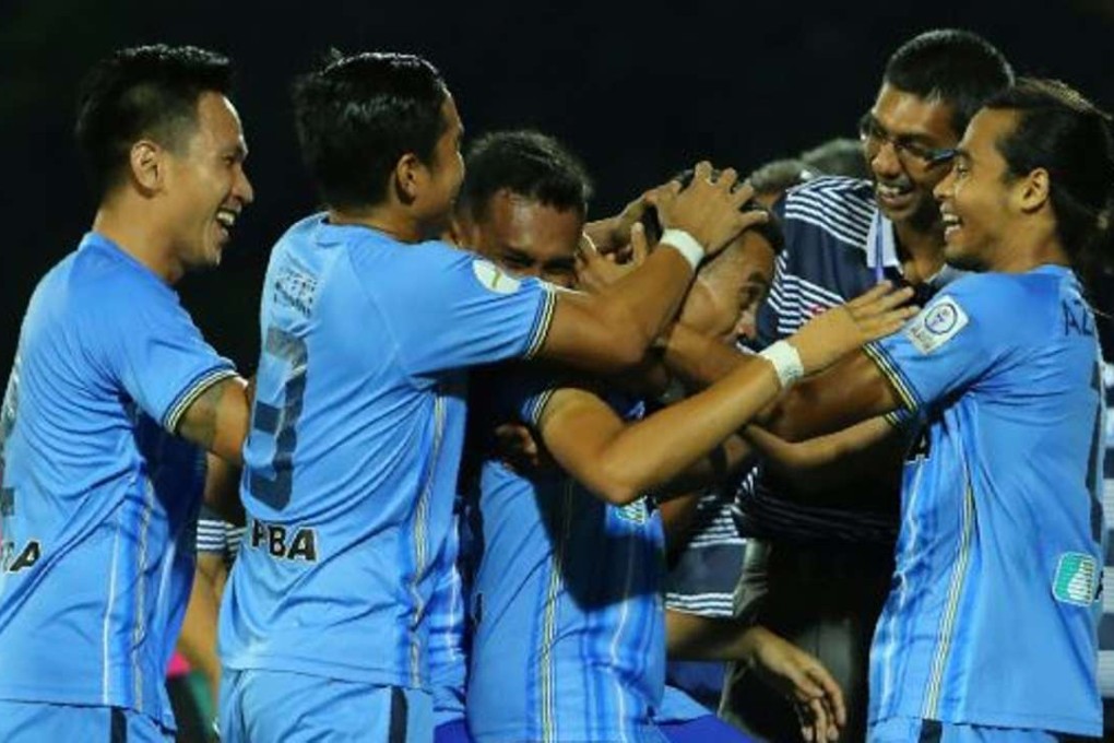 Mohamad Faiz Subri is congratulated on his goal. Photo: thestar.com.my