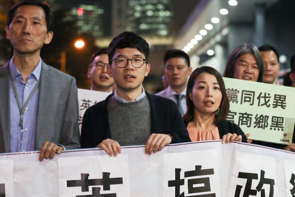 From left, Yiu Chung-yim, Nathan Law Kwun-chung, Lau Siu-lai, Leung Kwok-hung and James To Kun-sun protest against Leung Chun-ying outside the Legislative Council. Photo: Nora Tam