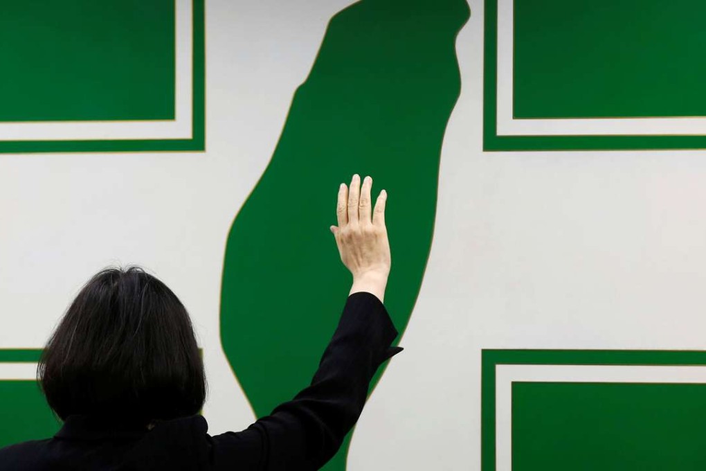 Taiwanese President Tsai Ing-wen stands in front of a Democratic Progressive Party flag at her inauguration in May. Photo: Reuters