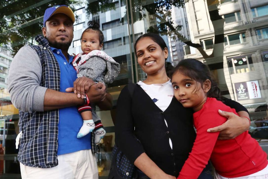 From left, Supun Thilina Kellapatha, his seven-month-old son Dinath, wife Nadeeka Dilrukshi Nonis and daughter Sethumdi, five. The family gave shelter to Edward Snowden during his time in the city in 2013. years old, poses for a picture in Wan Chai. Ajith who sheltered Snowden in Hong Kong. 02DEC16 SCMP / Photo: Jonathan Wong